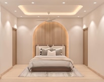 A modern bedroom with a stylish, neutral aesthetic.