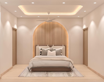 A modern bedroom with a stylish, neutral aesthetic.