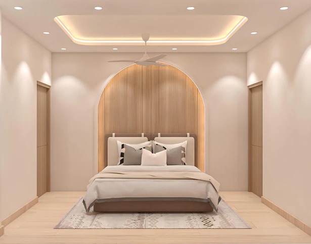 A modern bedroom with a stylish, neutral aesthetic.