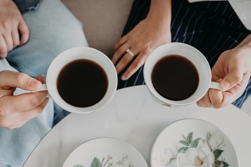 Two people are enjoying coffee together.