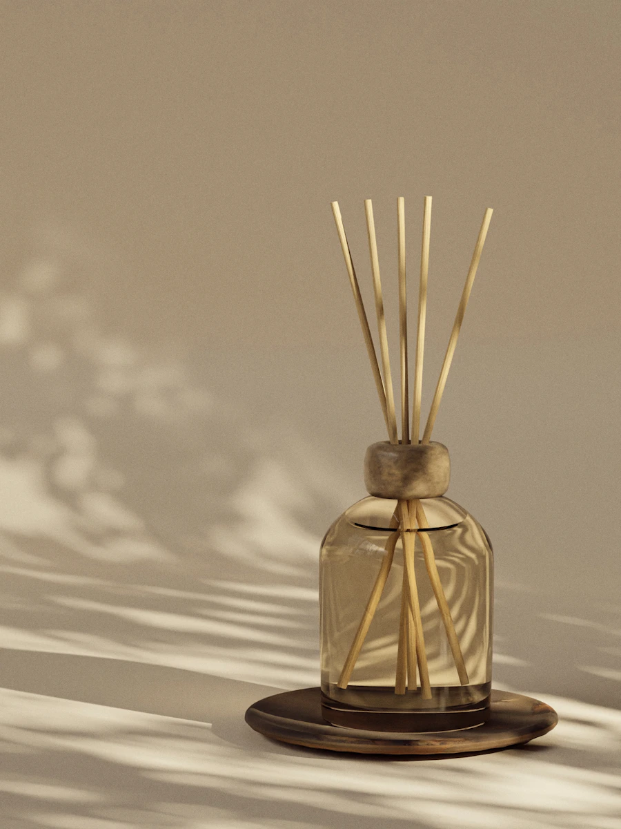 Reed diffuser with wooden reeds on a shelf