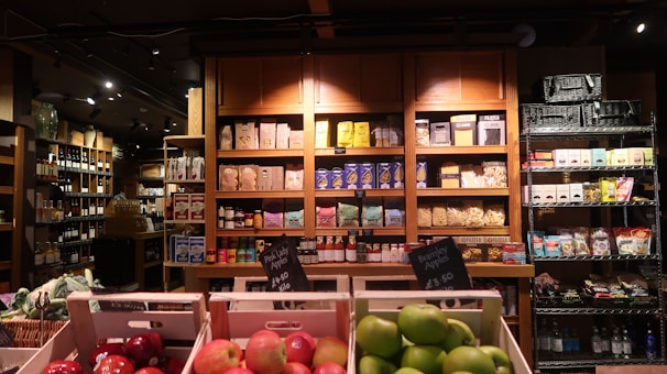 A grocery store displayed shelves of various products.