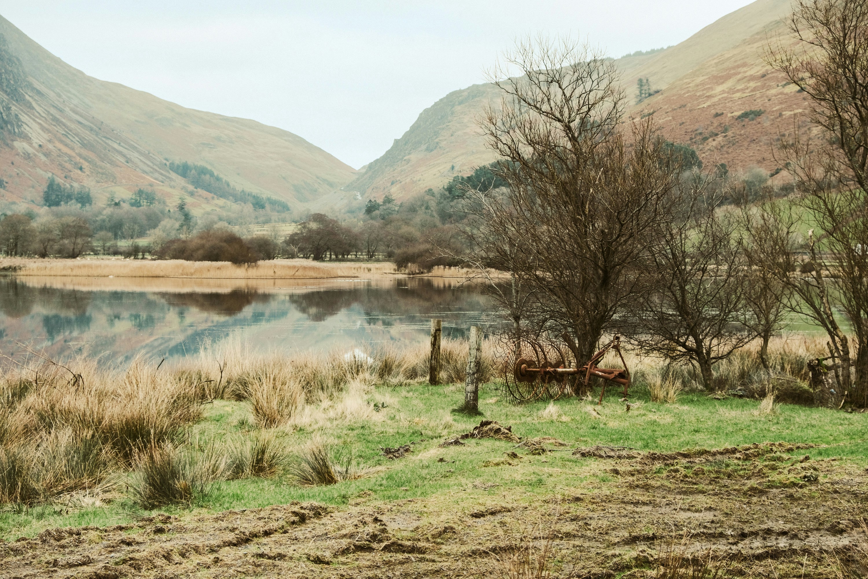 Mountains and a lake create a serene landscape.