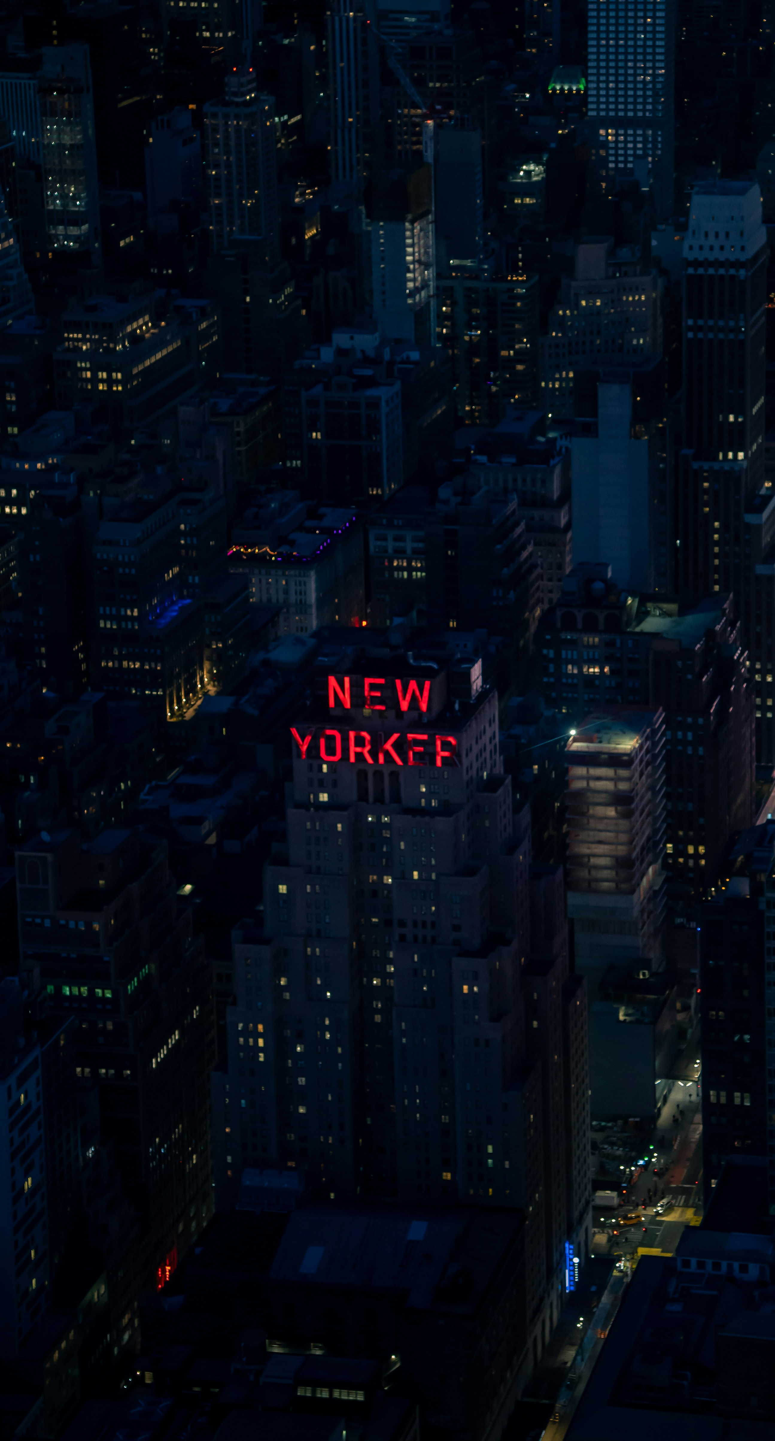 Nighttime view of new york city skyscrapers.