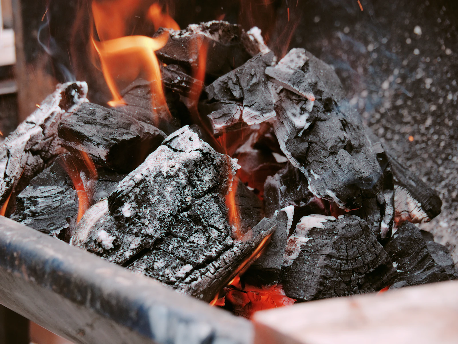 Charcoal glowing in the kitchen hearth