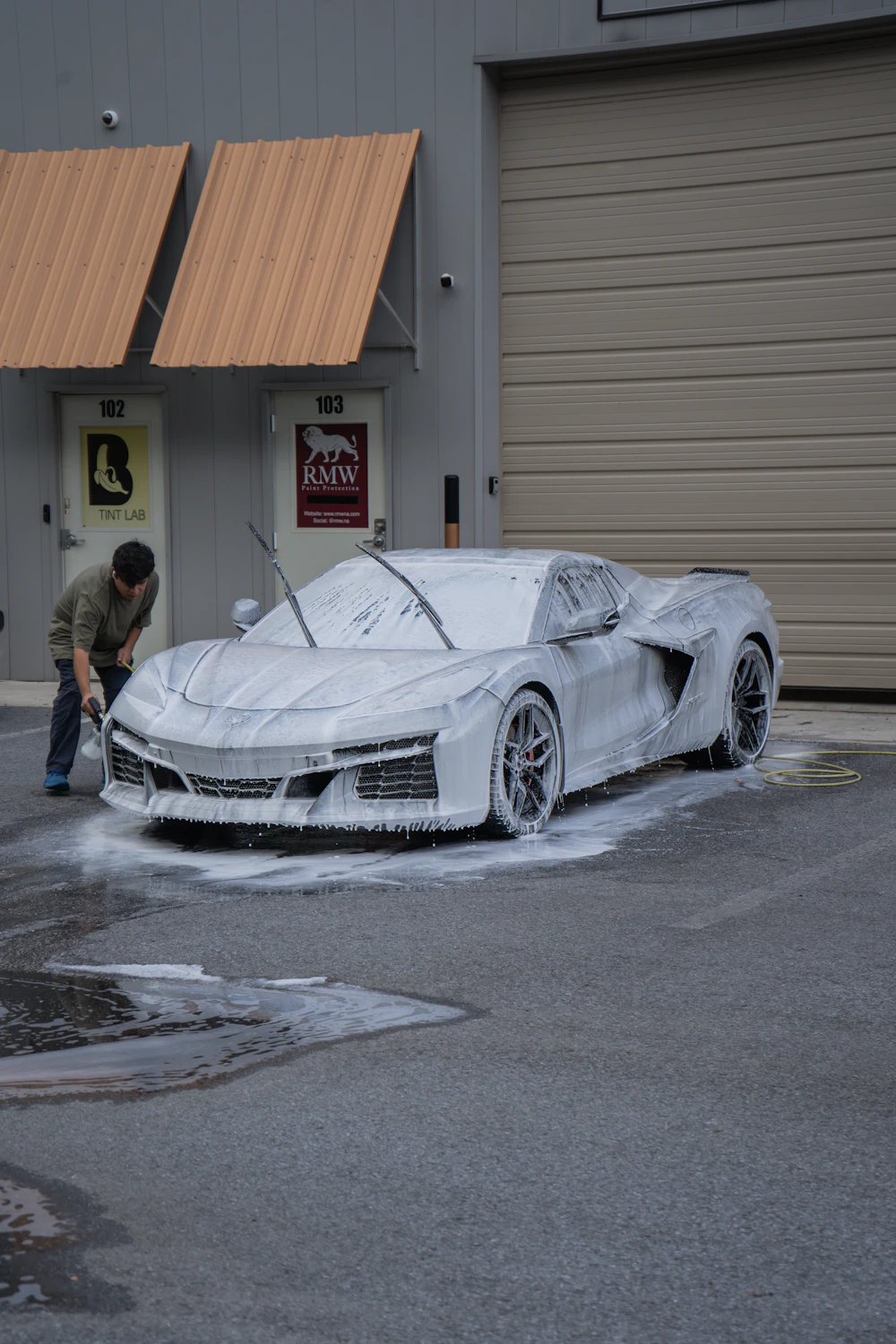 Car being washed with thick foam