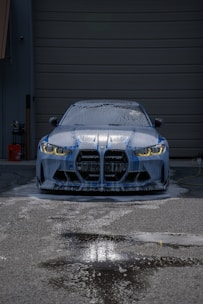 A BMW m4 gets a foamy car wash.