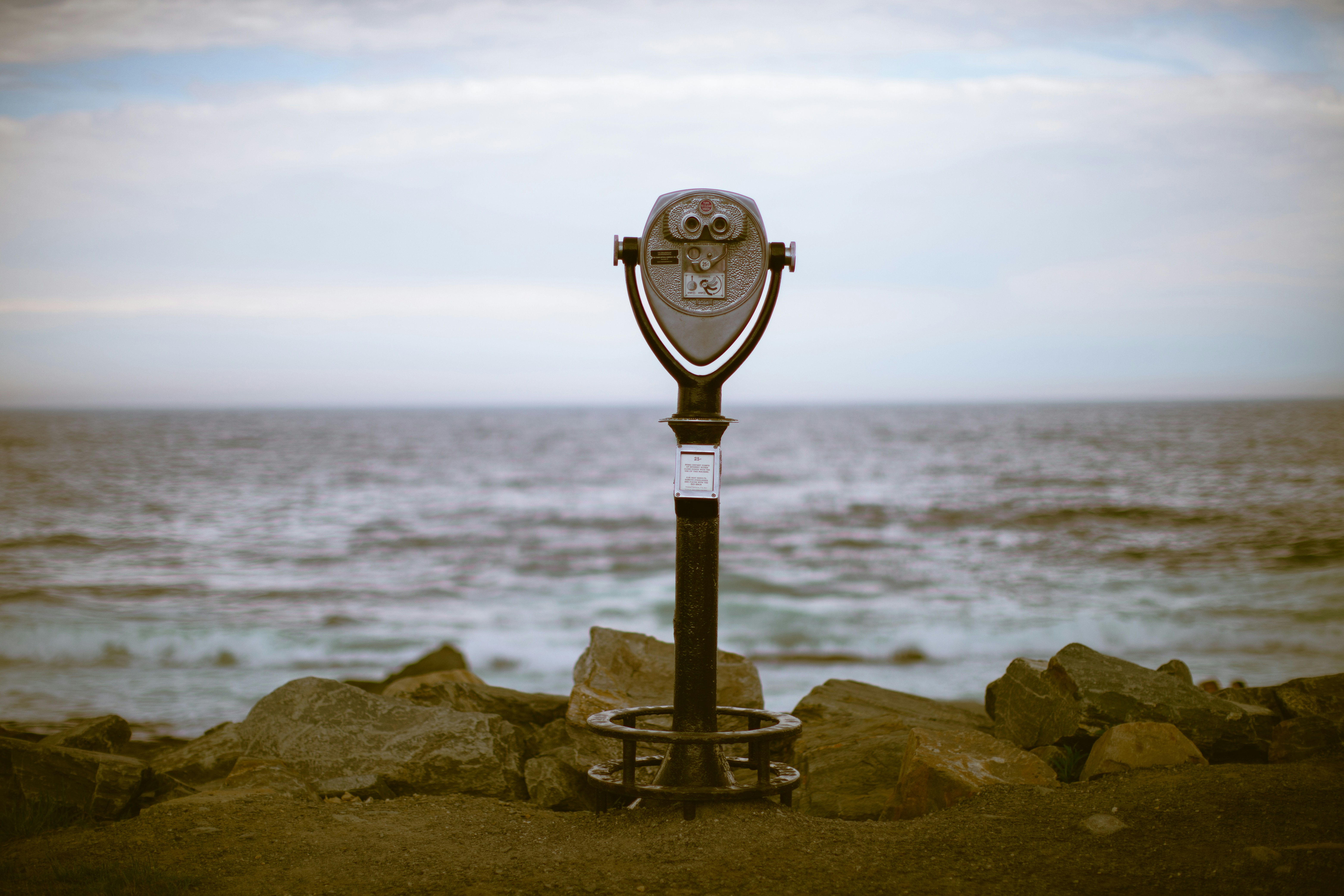 Binoculars overlook the vast ocean.