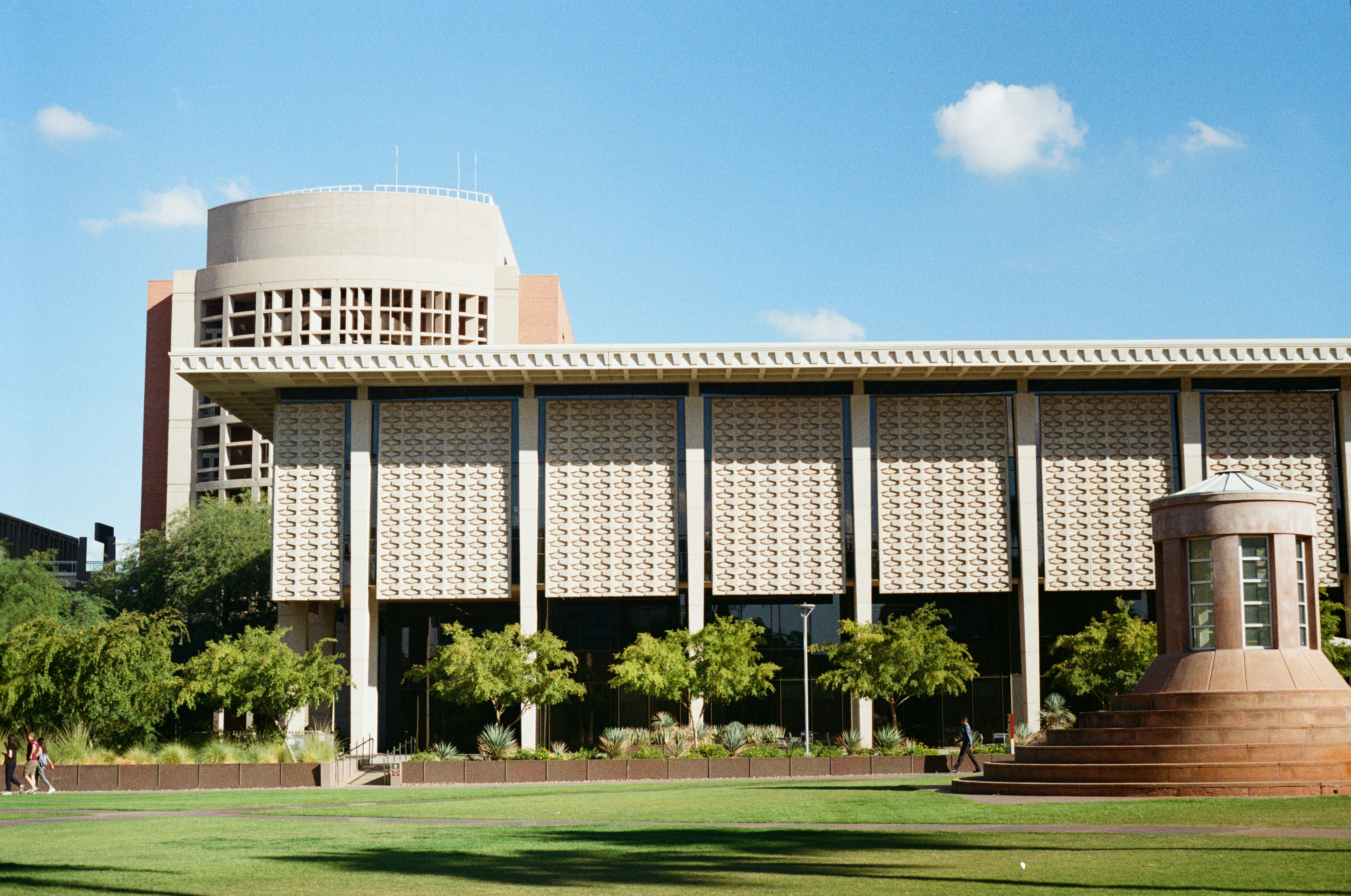 A modern building with a blue sky in the background.