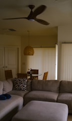 A cozy living room with a sofa.