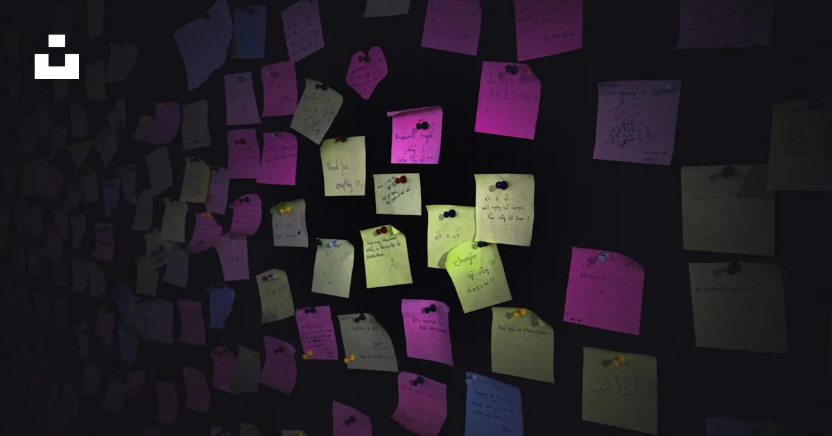 Colorful sticky notes cover a dark wall. photo – Free Note Image on ...