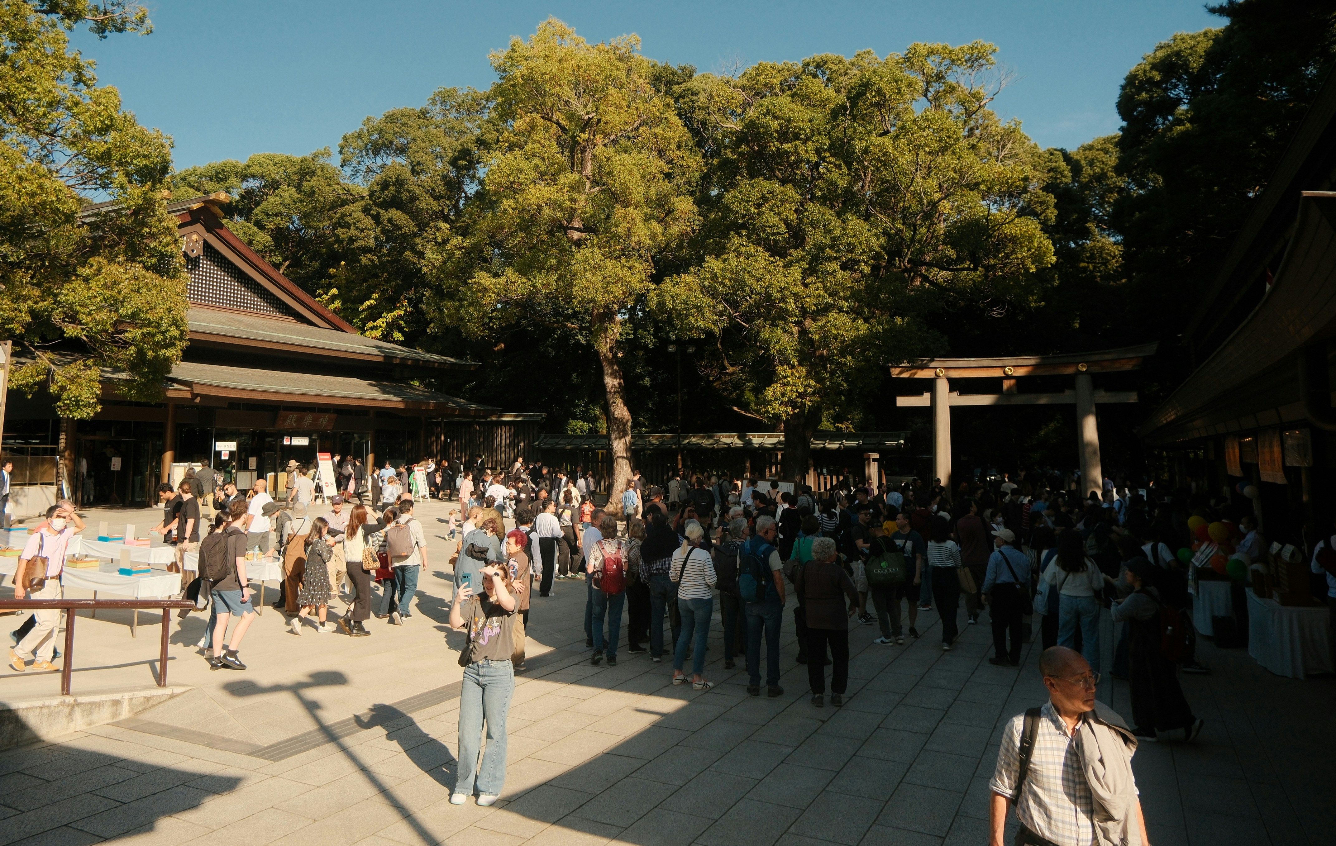 Crowd of people doing Hatsumode at a Japanese shrine
