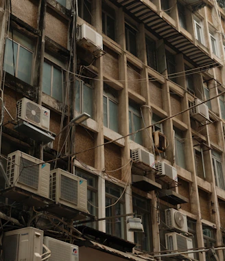 Old building with numerous air conditioning units