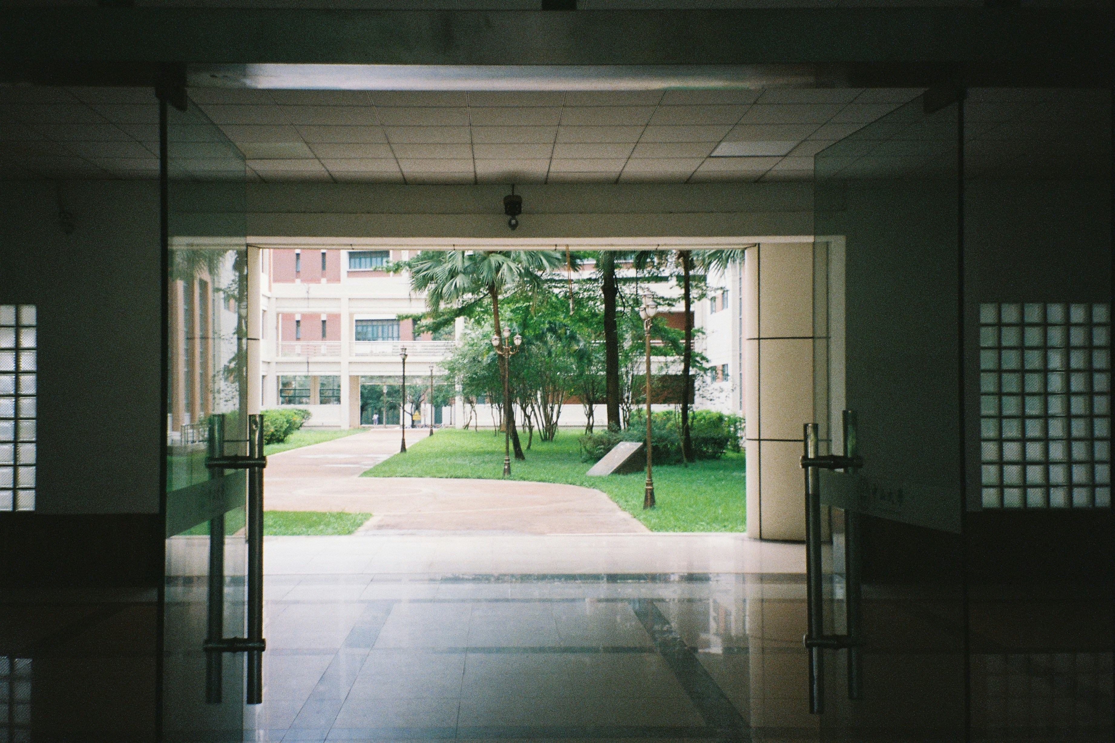 View of a courtyard through an entrance.
