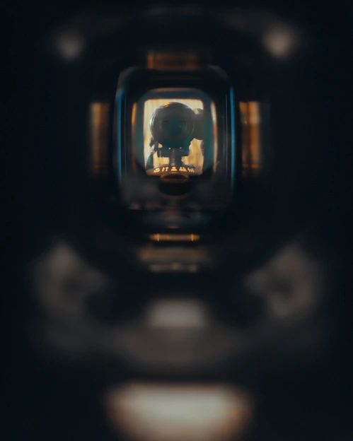 A skull reflected in a tiny, dark window.