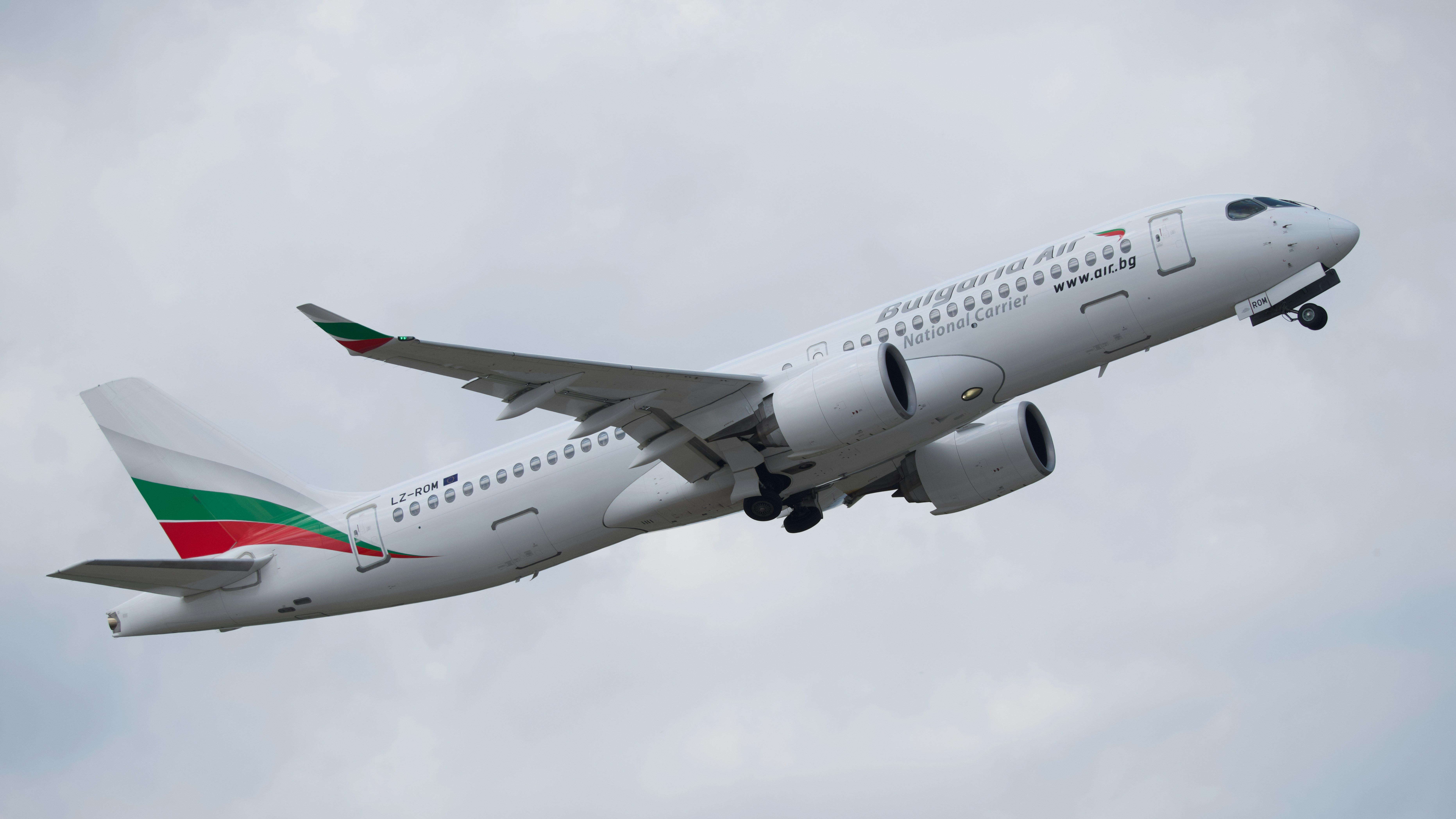 An airplane, with the bulgarian flag, is taking off.