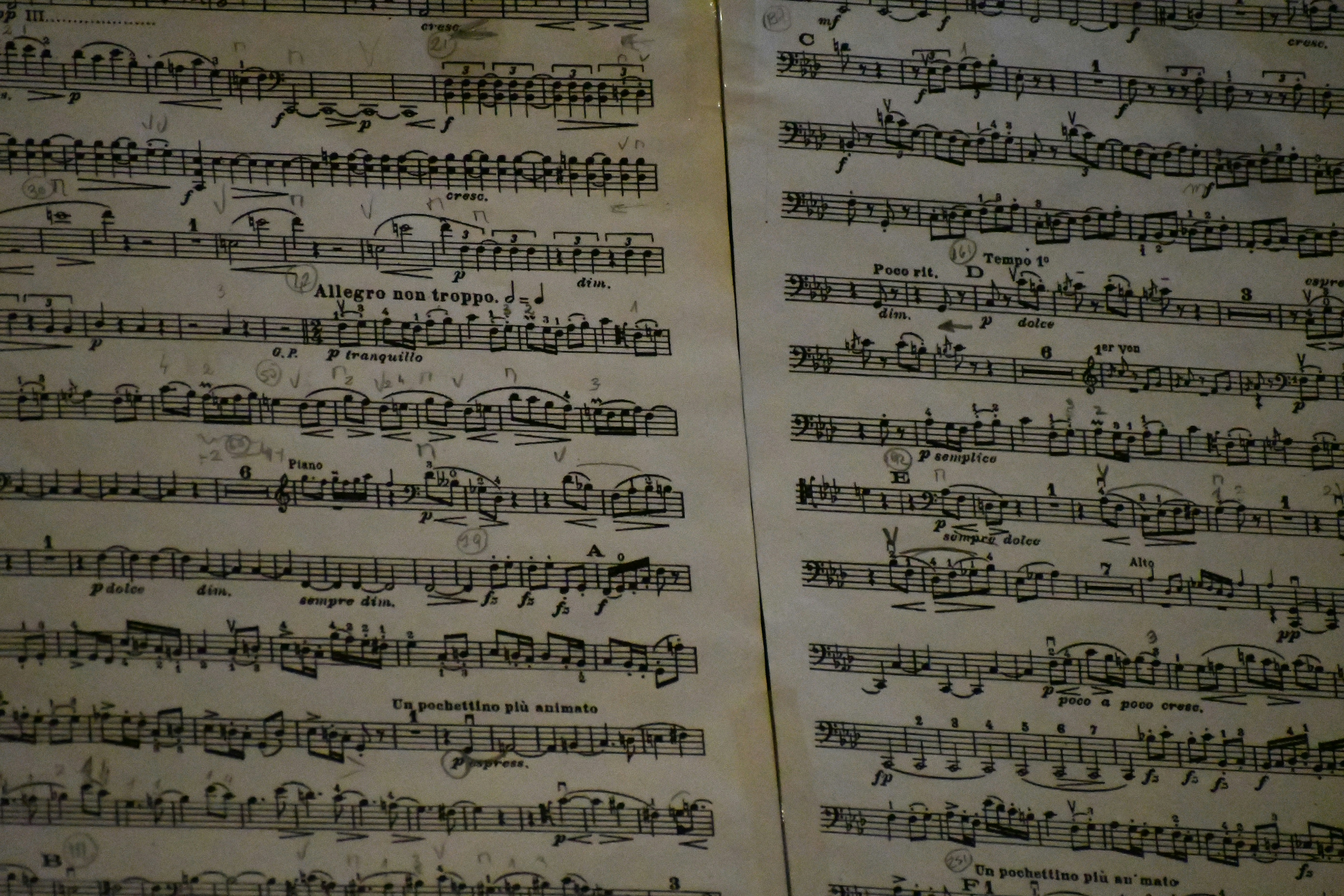 Old sheet music with intricate notes and markings.