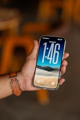 A person is holding an iphone.