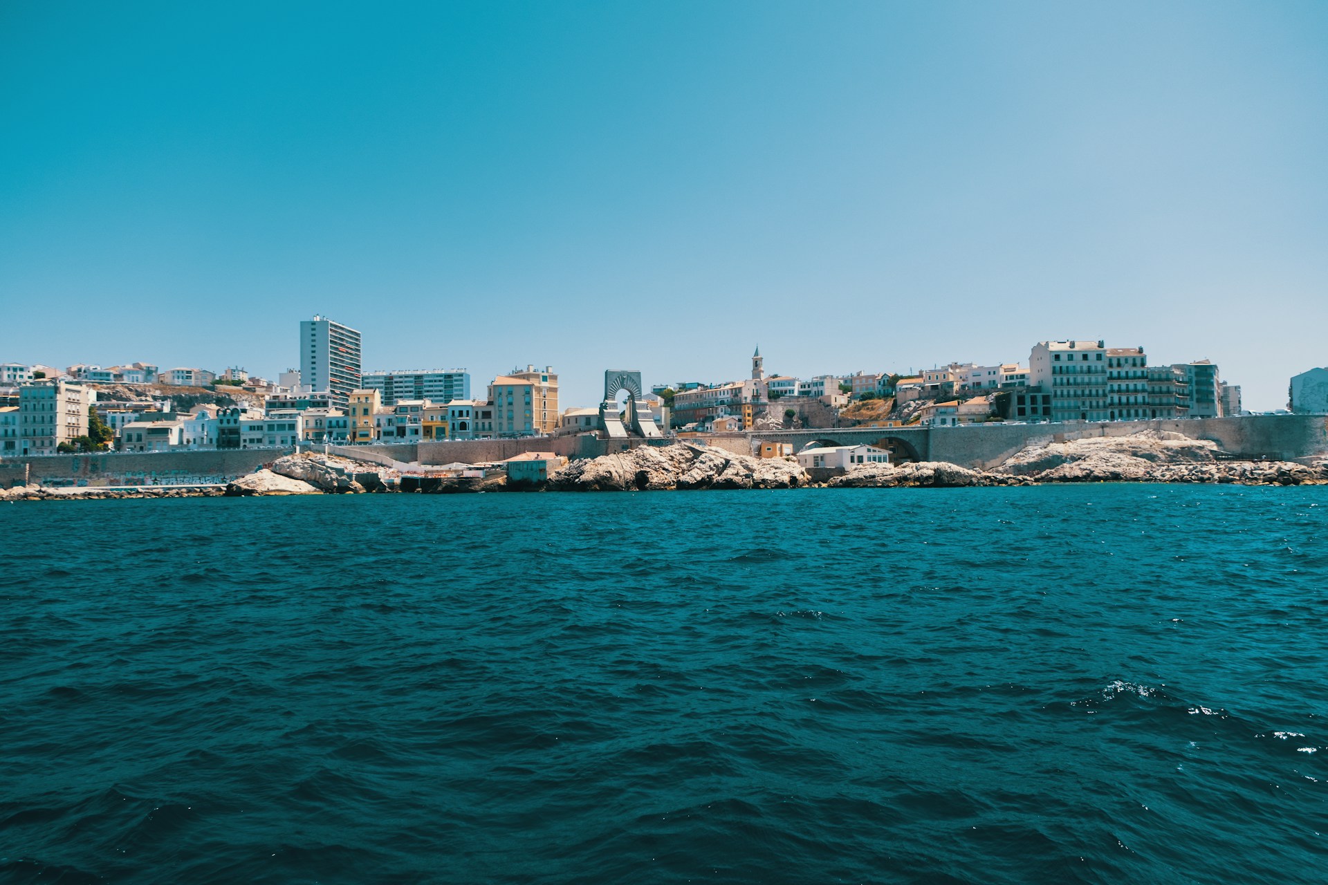 City skyline viewed from the water on a sunny day.