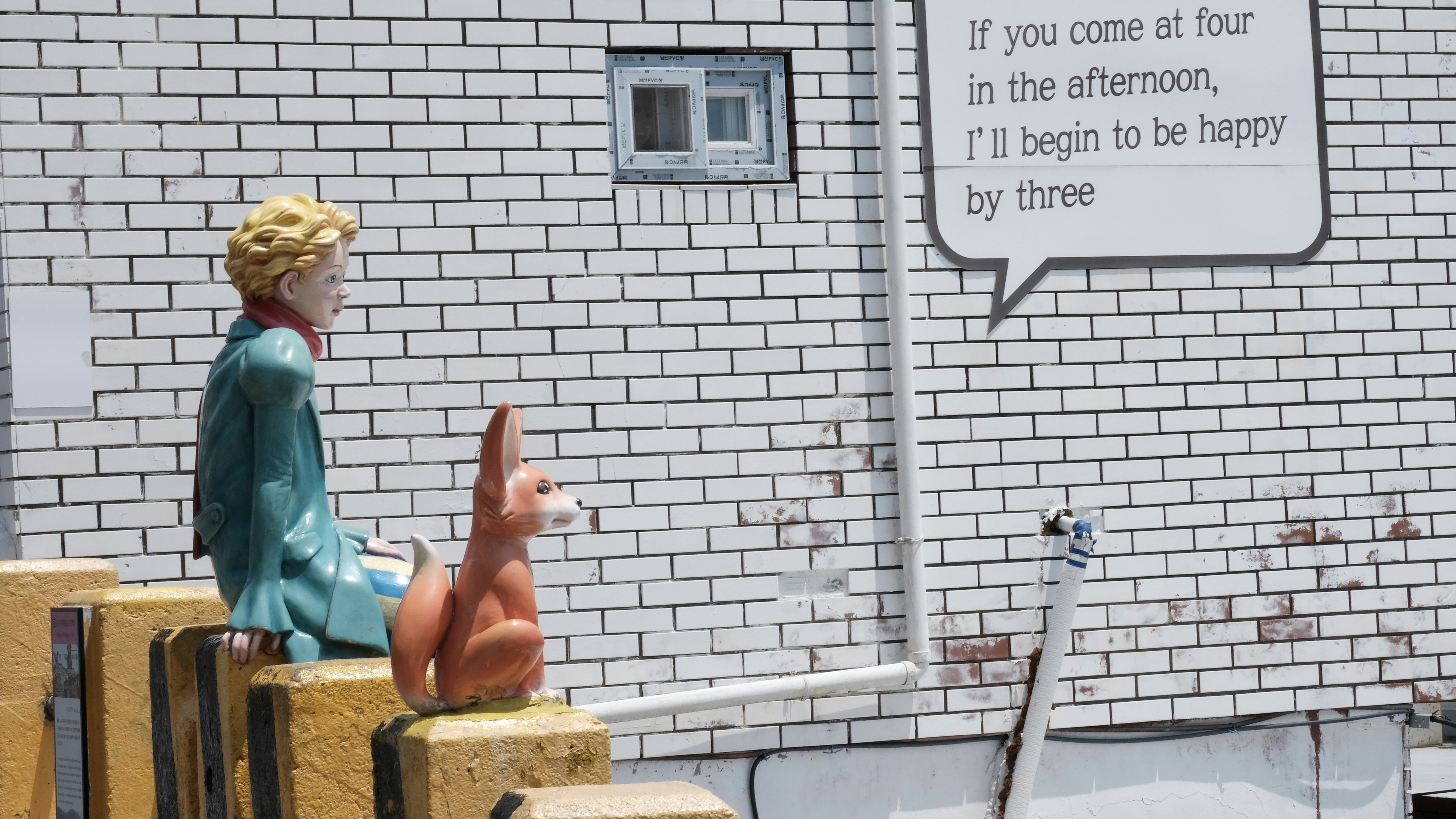 The little prince sculpture is with his fox friend