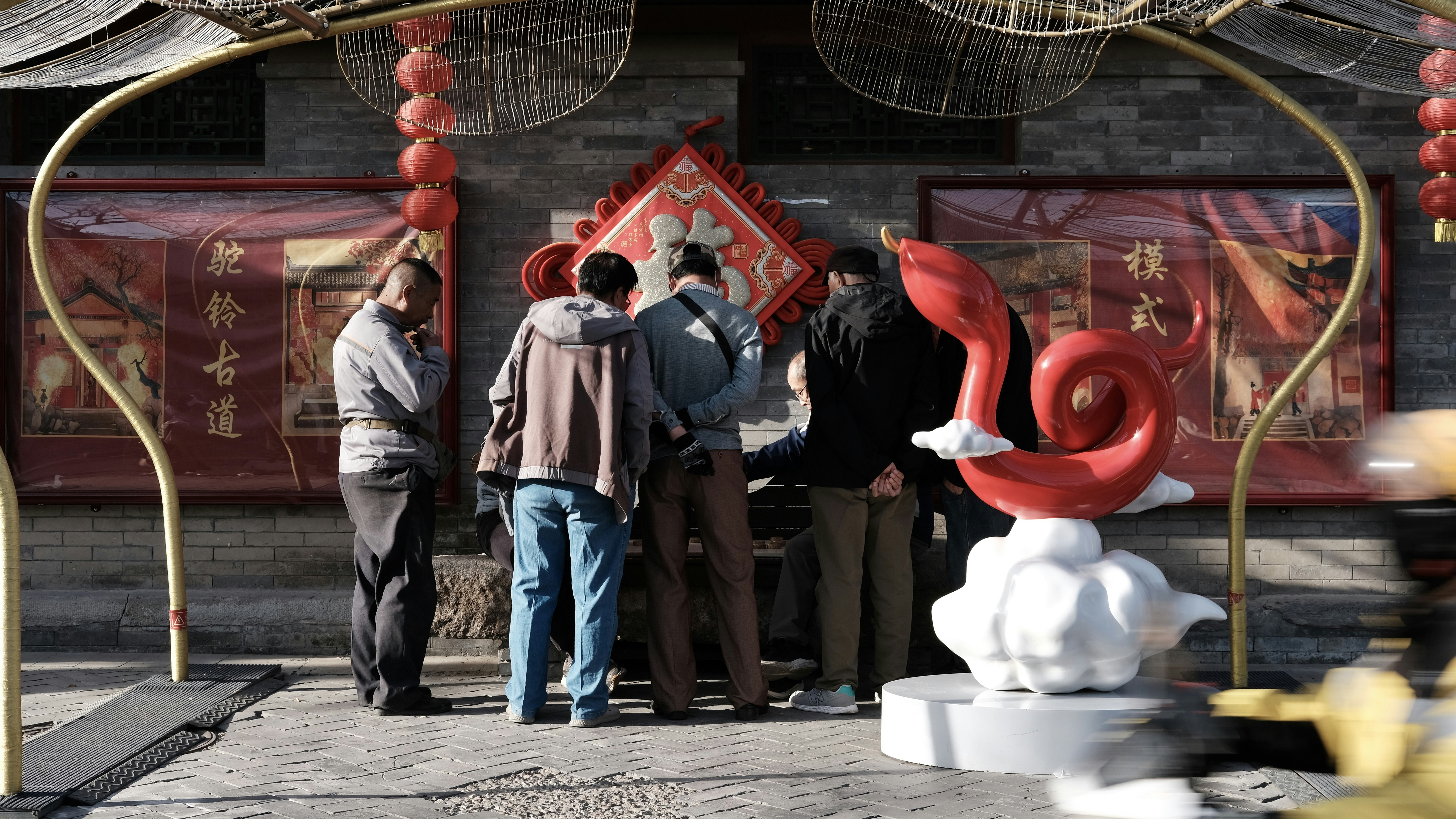 People gather around a festive chinese new year display