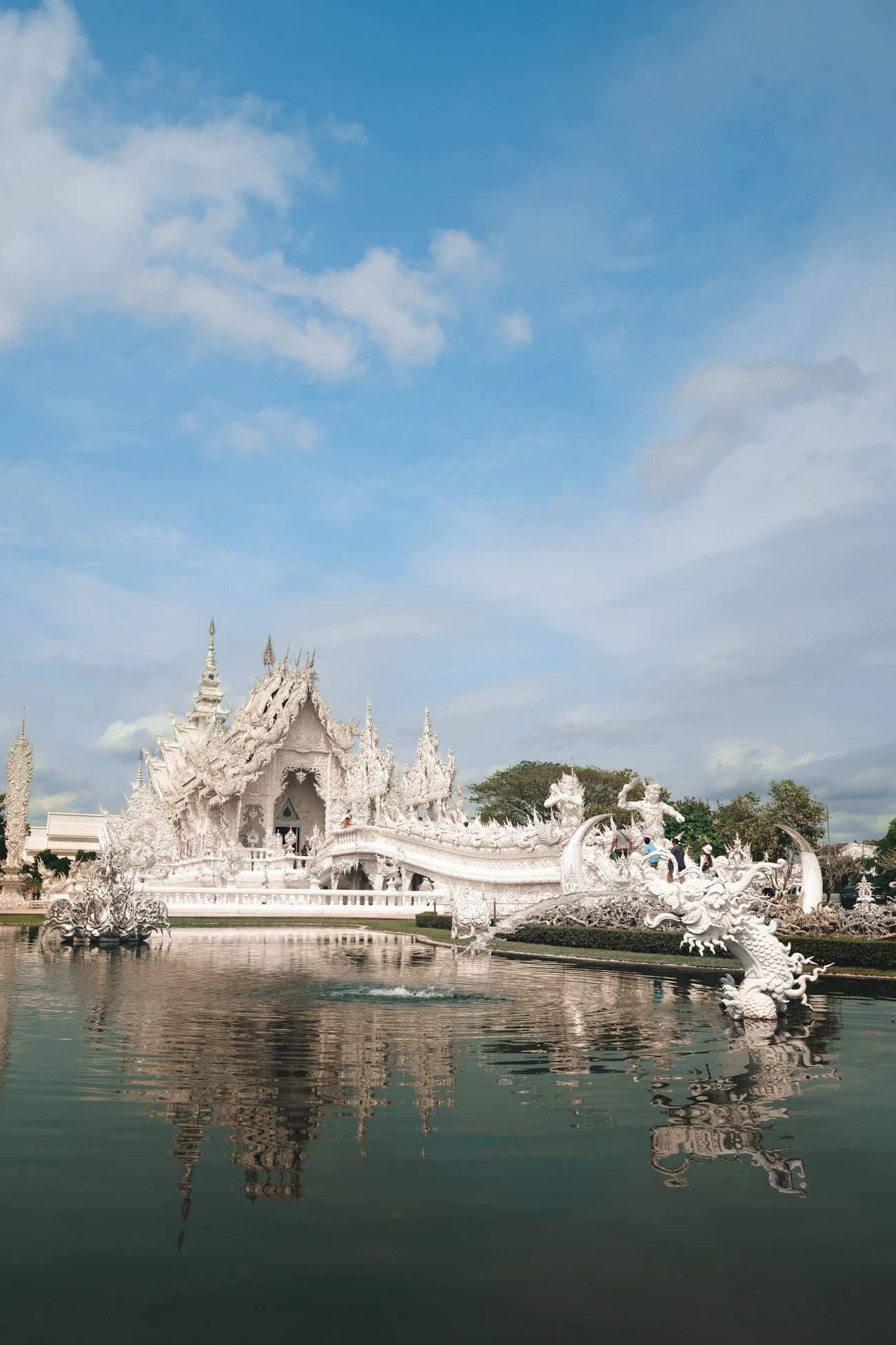 White Temple reflected in water at Chiang Rai, Thailand