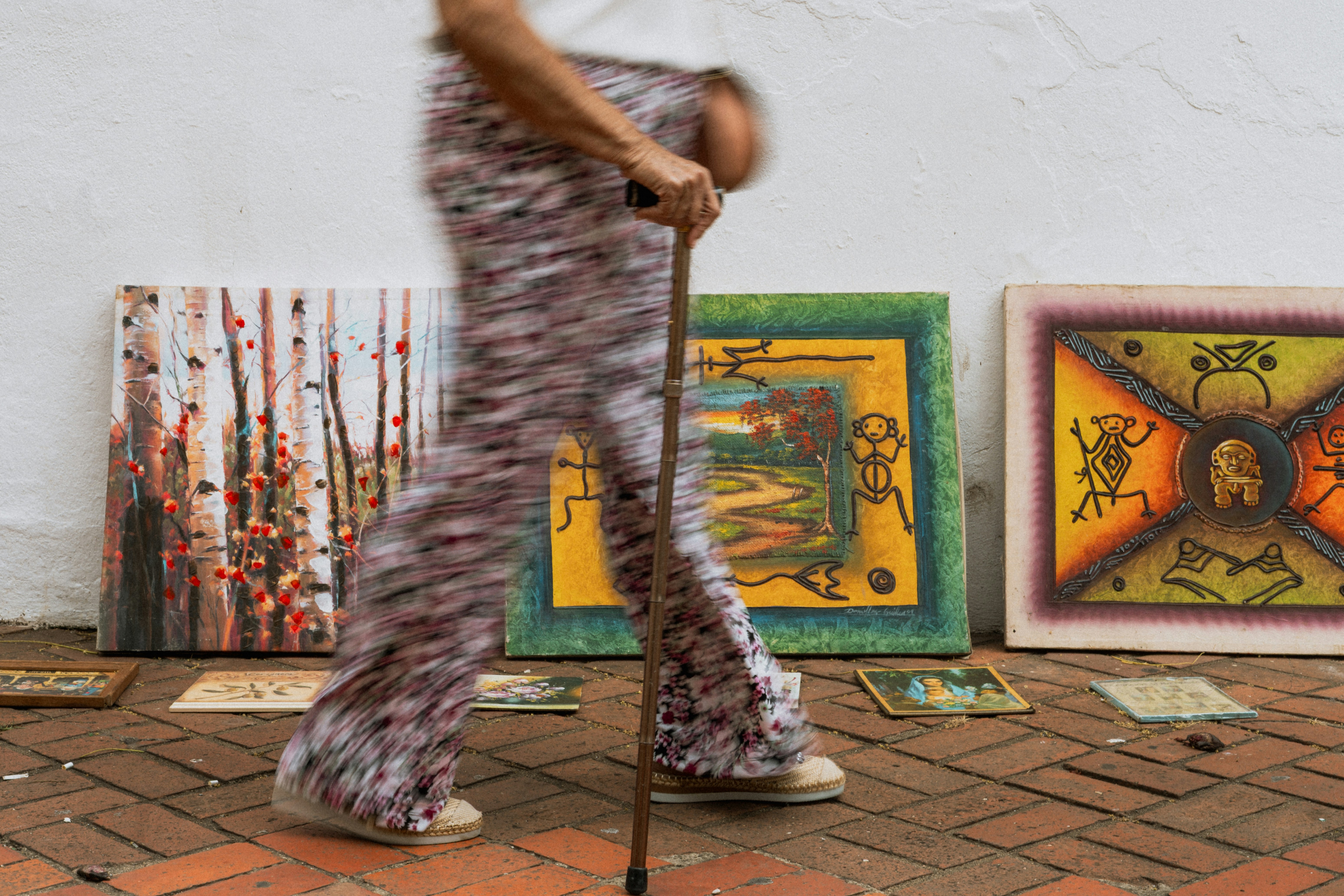 Local life scene with a person walking near street art