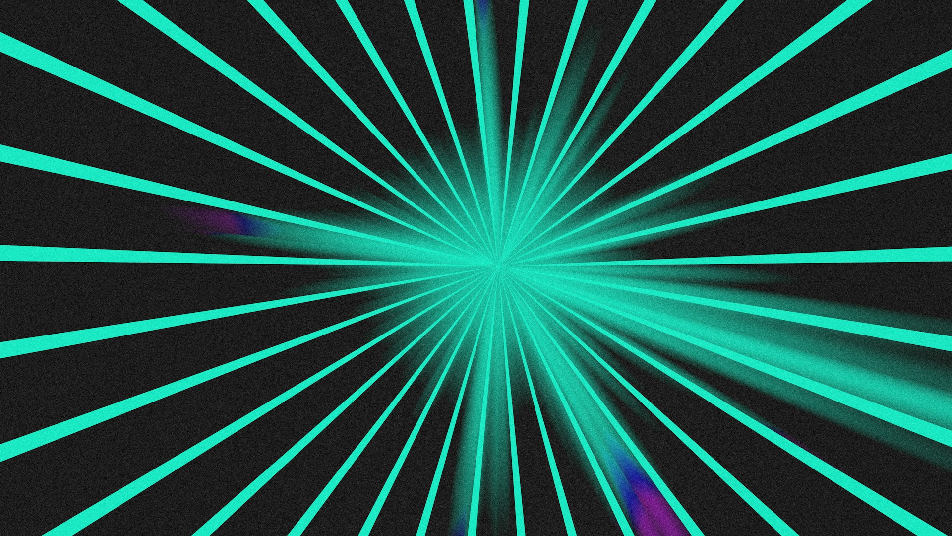 A bright teal light explodes against a black background.