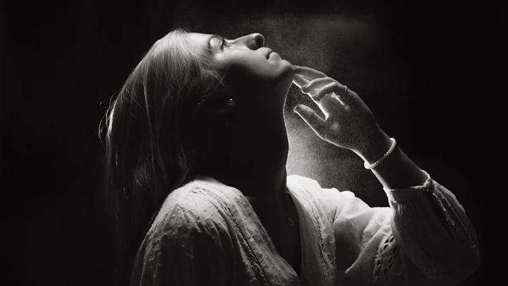 Woman with soft light falling across her face