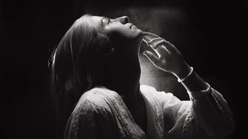 Golden light—woman admiring sunlight on her face