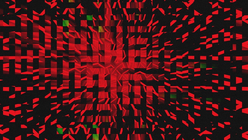 Red and black abstract pattern resembling an explosion.