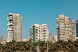 Tall buildings against blue sky