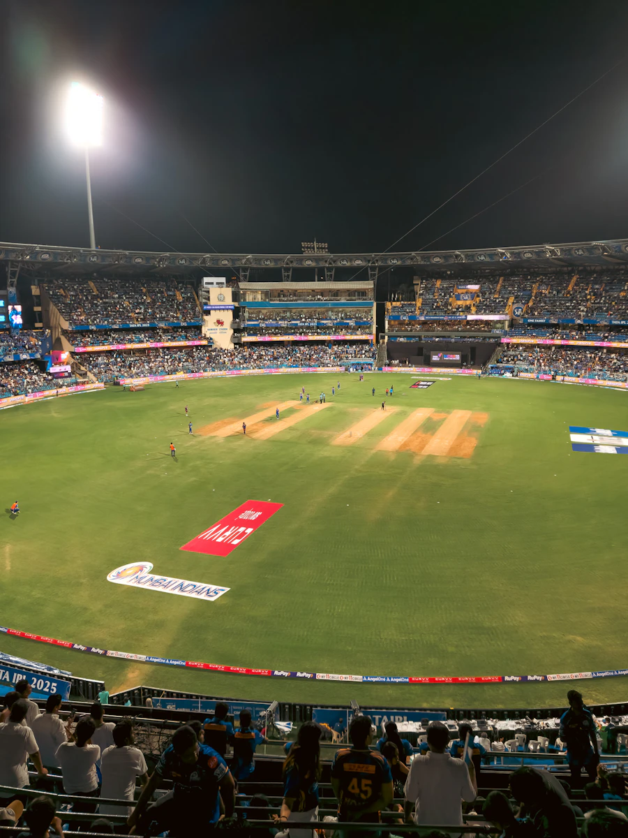 Night cricket under bright stadium lights