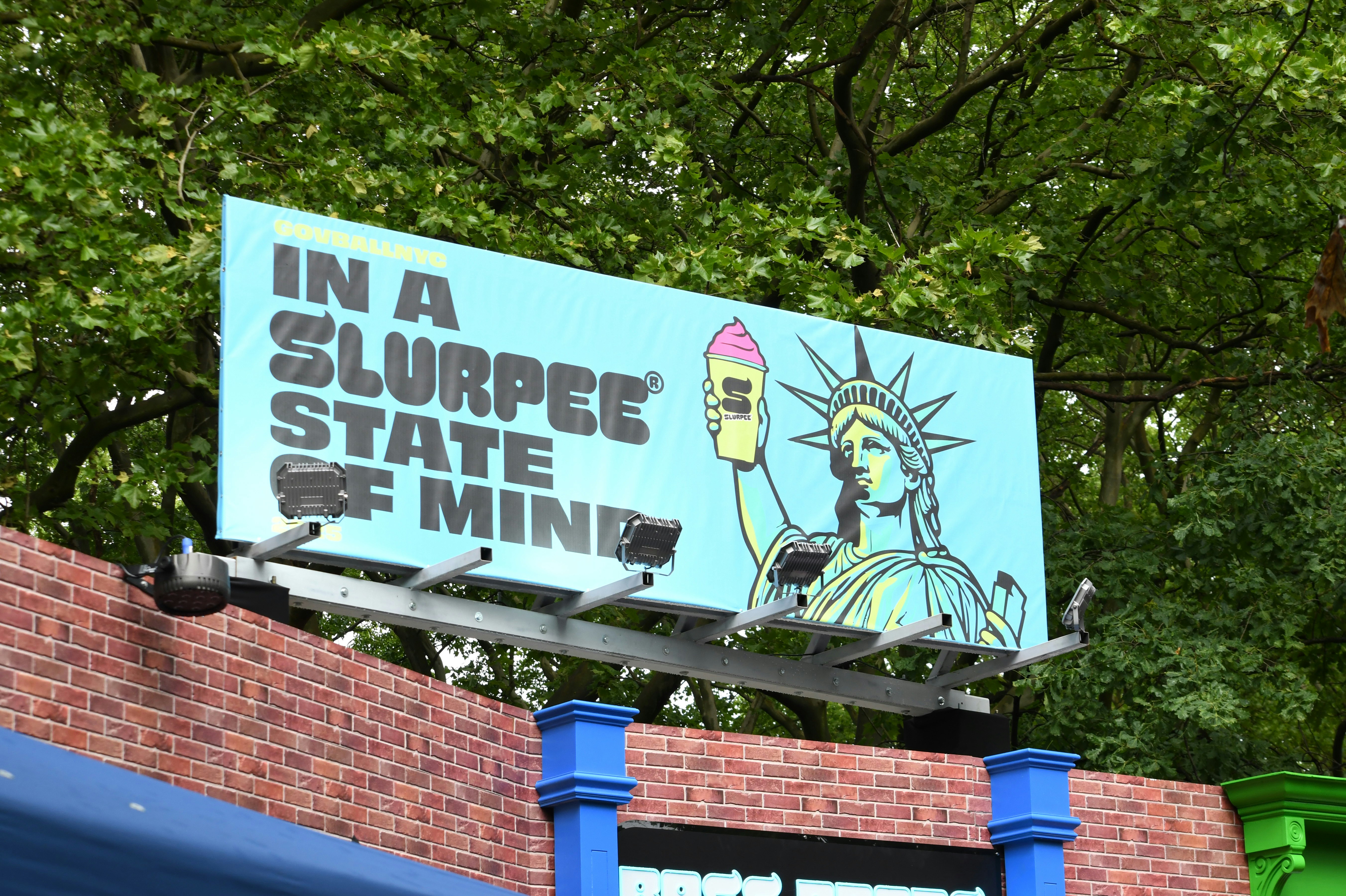 A 7-eleven billboard promoting slurpees.