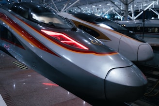 High-speed trains are ready at the station.