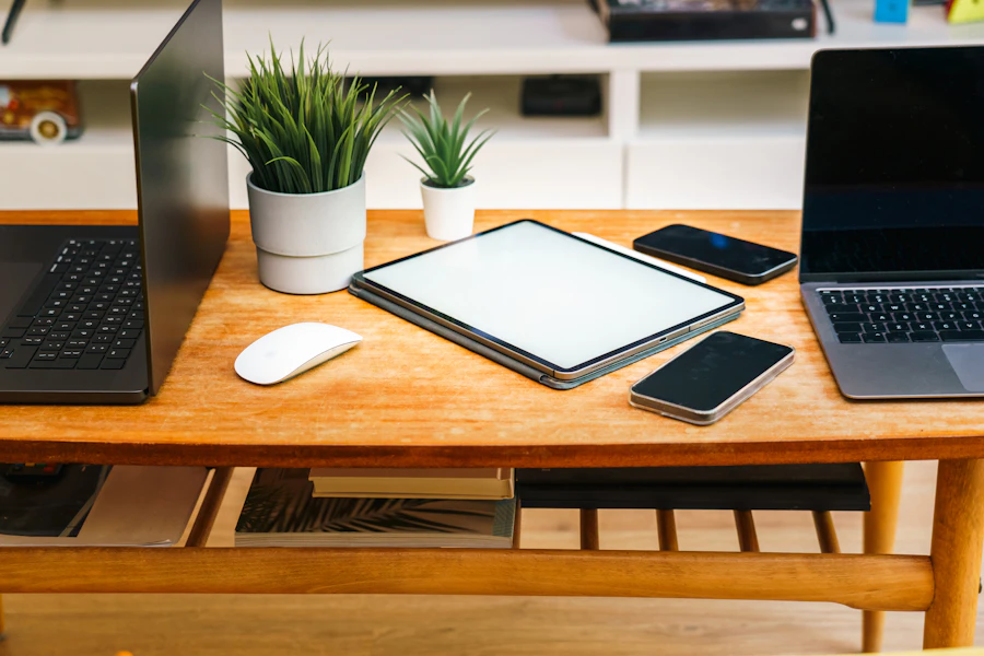 Laptop, tablet, and phone on a desk, representing endpoint security across every device