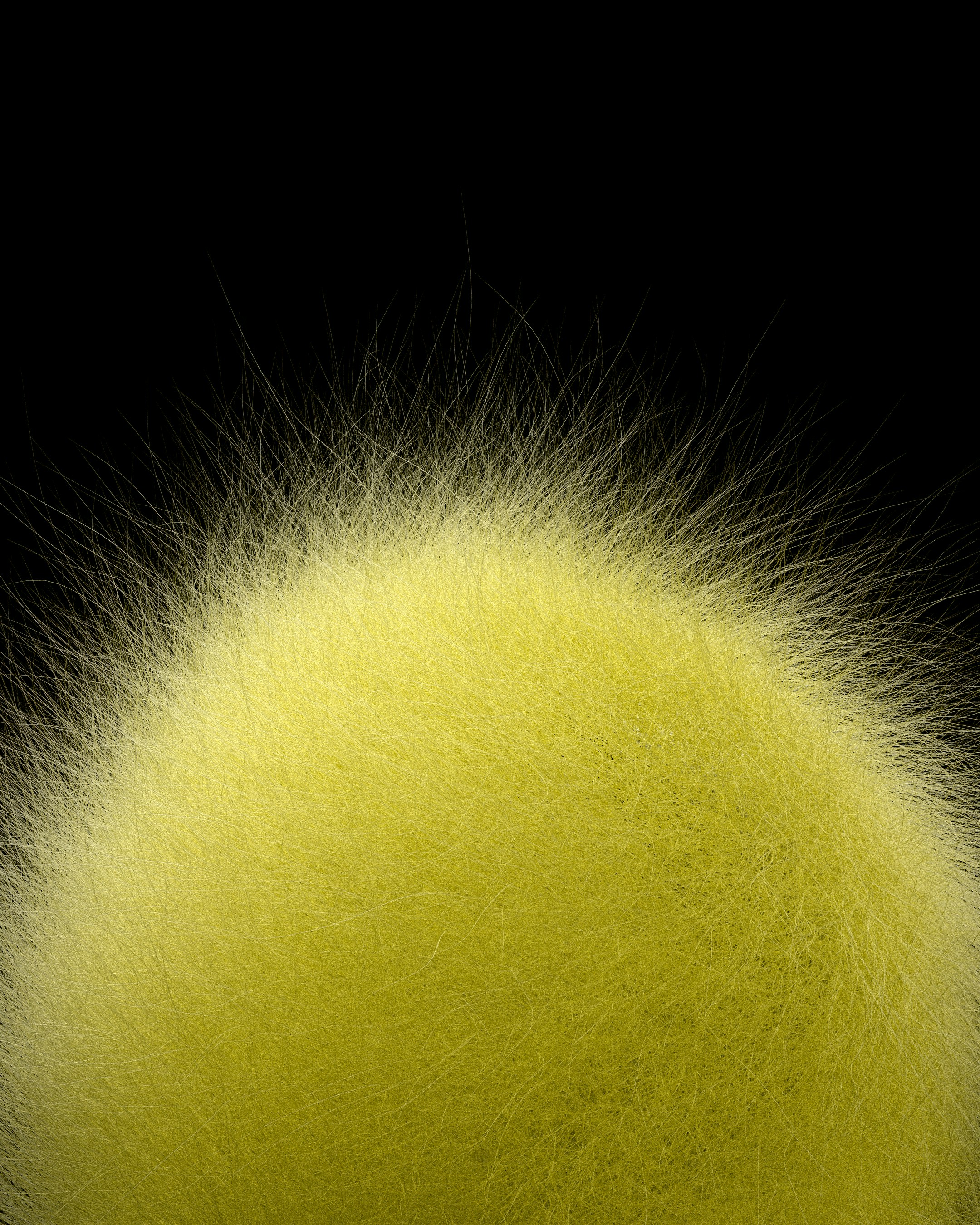 Close-up of a yellow tennis ball against black background