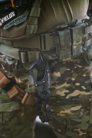 Soldier's belt and gear with tactical clip.