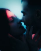 A couple is about to kiss.