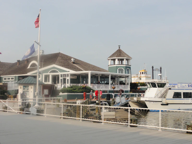 Waterfront restaurant on a pier with boats docked
