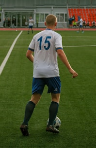 Soccer player in a white jersey with the number 15.
