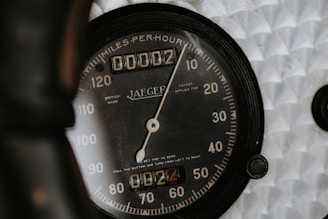 The speedometer shows zero miles per hour.
