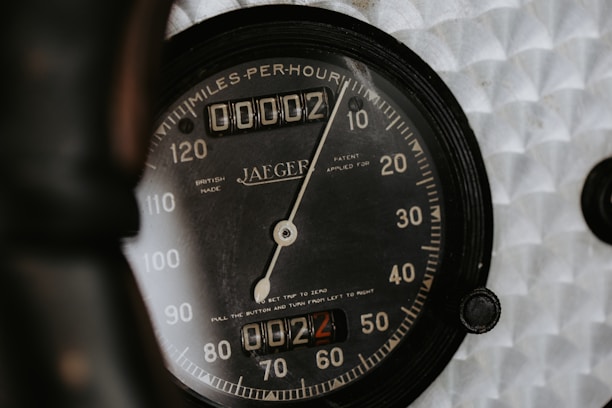 The speedometer shows zero miles per hour.