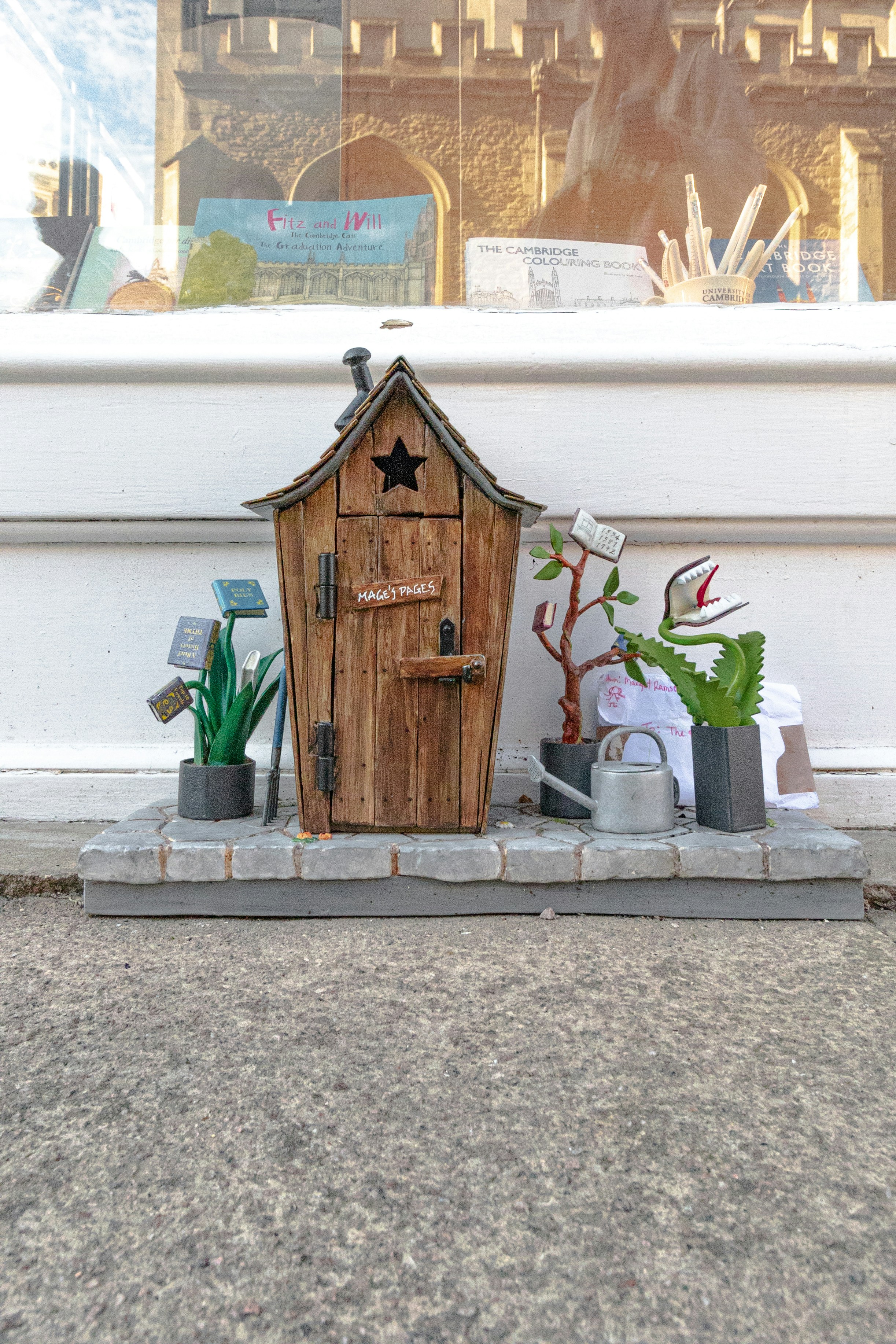 A whimsical miniature garden is on display.