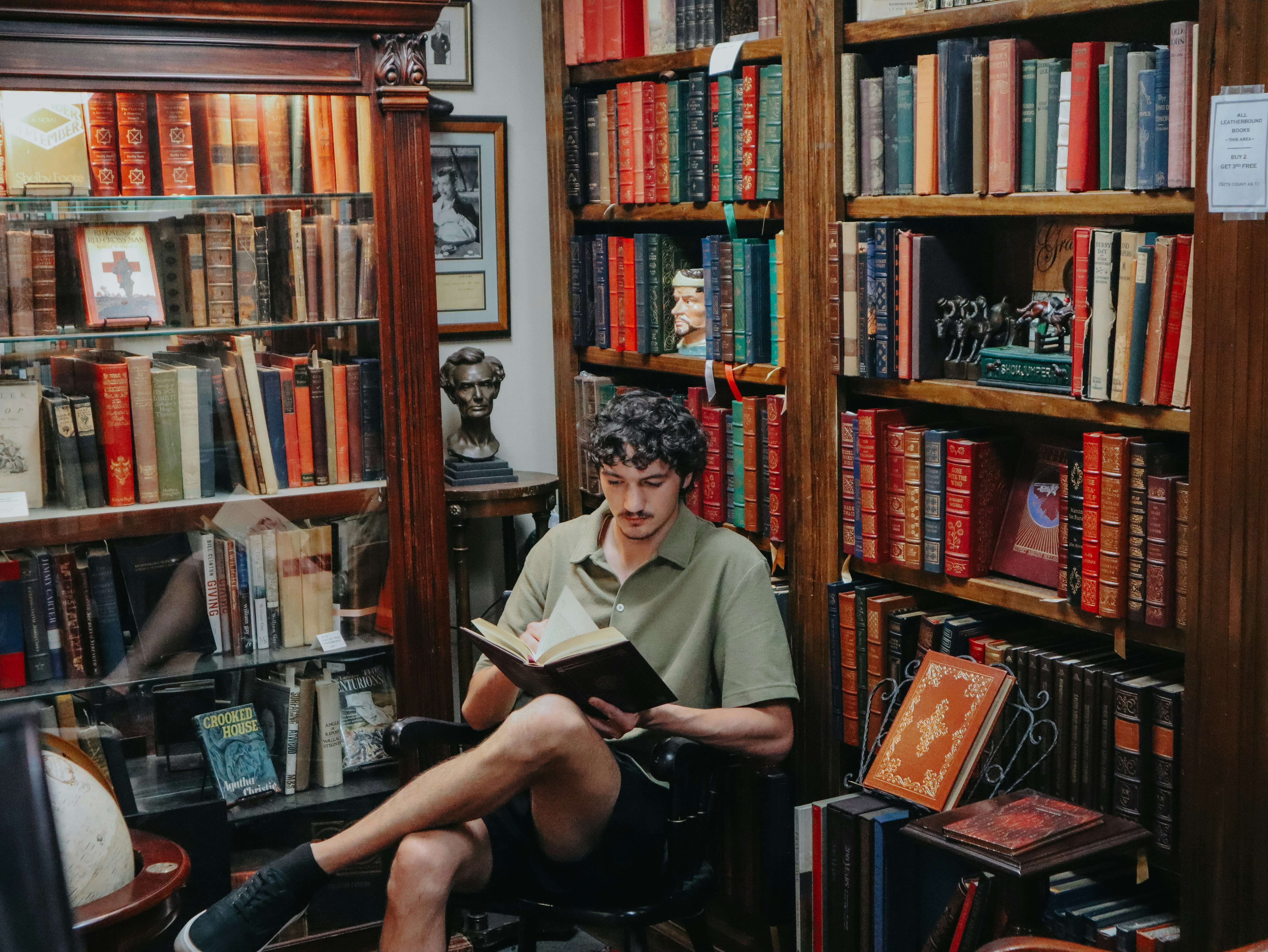 man sitting and reading