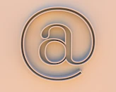 An "at" symbol on a beige background.