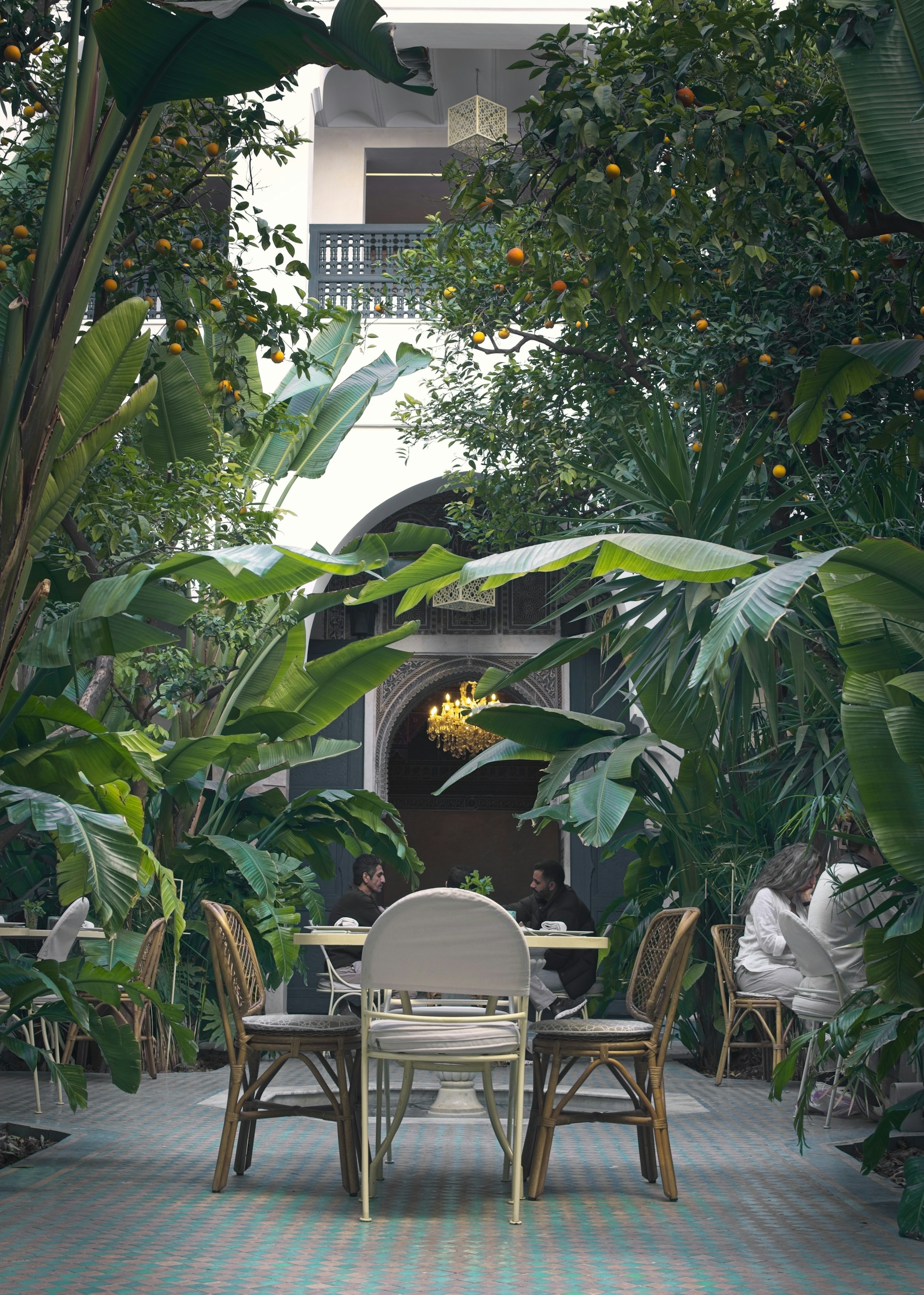 A lush garden restaurant offers intimate dining.