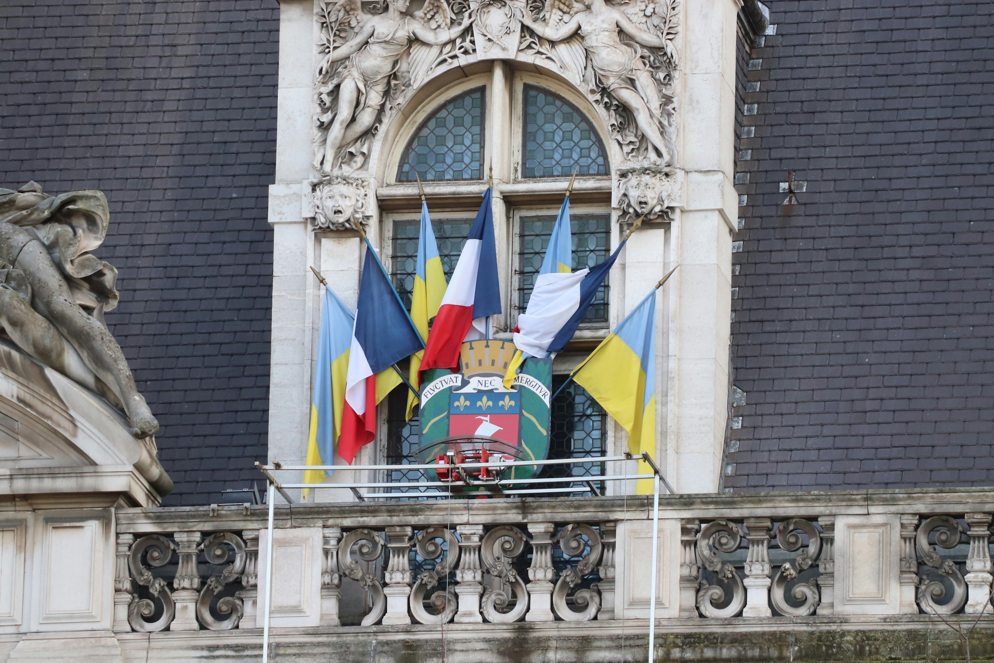 Balcony of Paris City Hall with French and Ukrainian flags, France