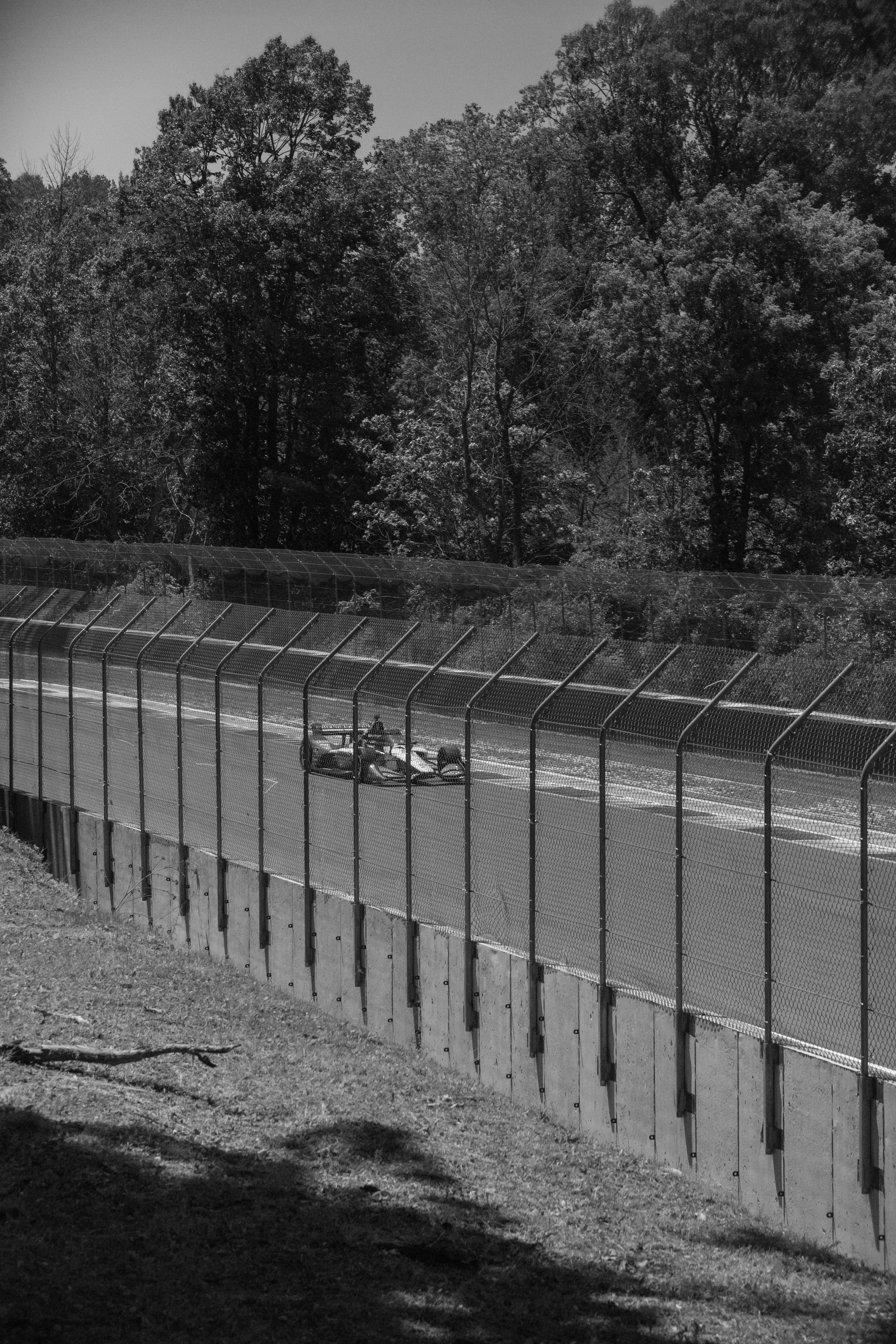 A race car speeds along a track.
