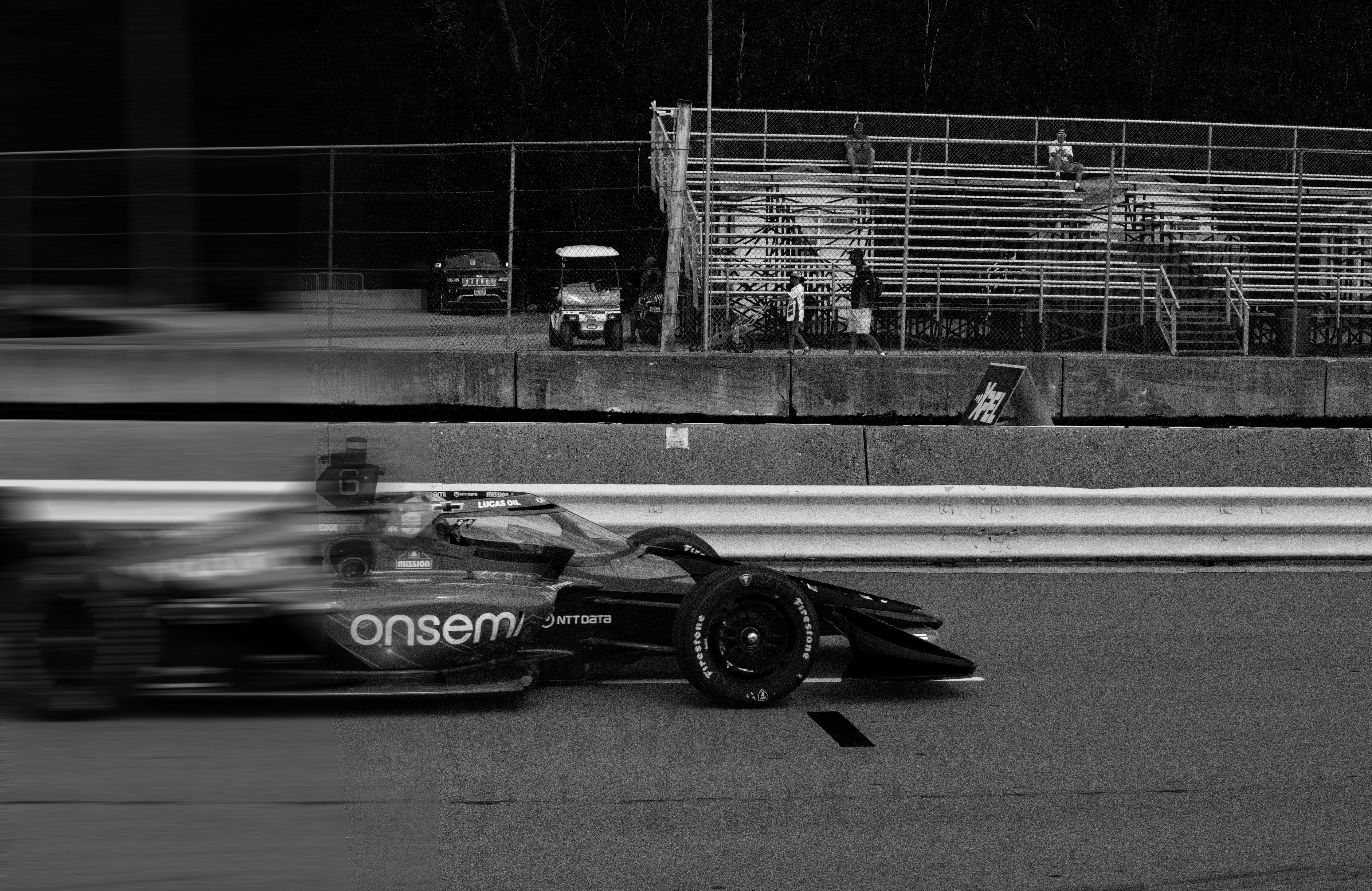 A formula 1 car speeds around the racetrack.